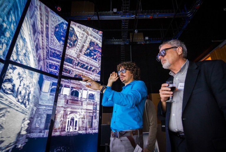 Vid demonstrating his software on the TourCave at Calit2 utilizing the interior data of the Hall of the 500 from Palazzo Vecchio. 