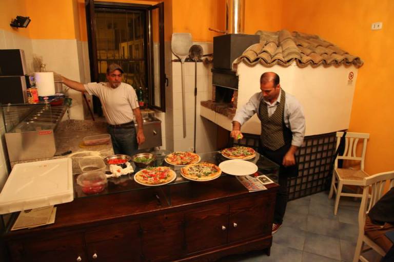 Pizza Preparation at La Casa Incantata in Rocca Imperiale