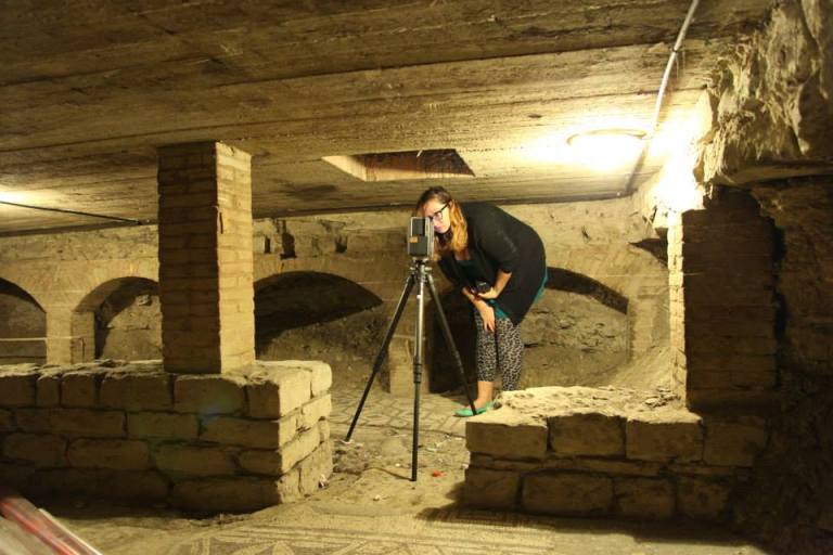 Ashley M. Richter setting up the scanner to image the subterranean level of the Baptistery of San Giovanni in Florence