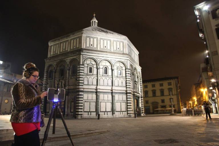 Ashley M. Richter laser scanning the exterior of the Baptistery of St. Giovanni, Florence.