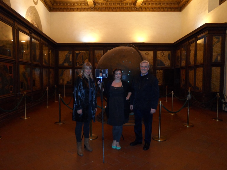 Art historian Katharina Giraldi-Haller, digital archaeology Ashley M. Richter, and foremost cultural heritage diagnostician Maurizio Seracini with the Faro Focus 3D in the Hall of Geographical Maps in Florence's Palazzo Vecchio. 